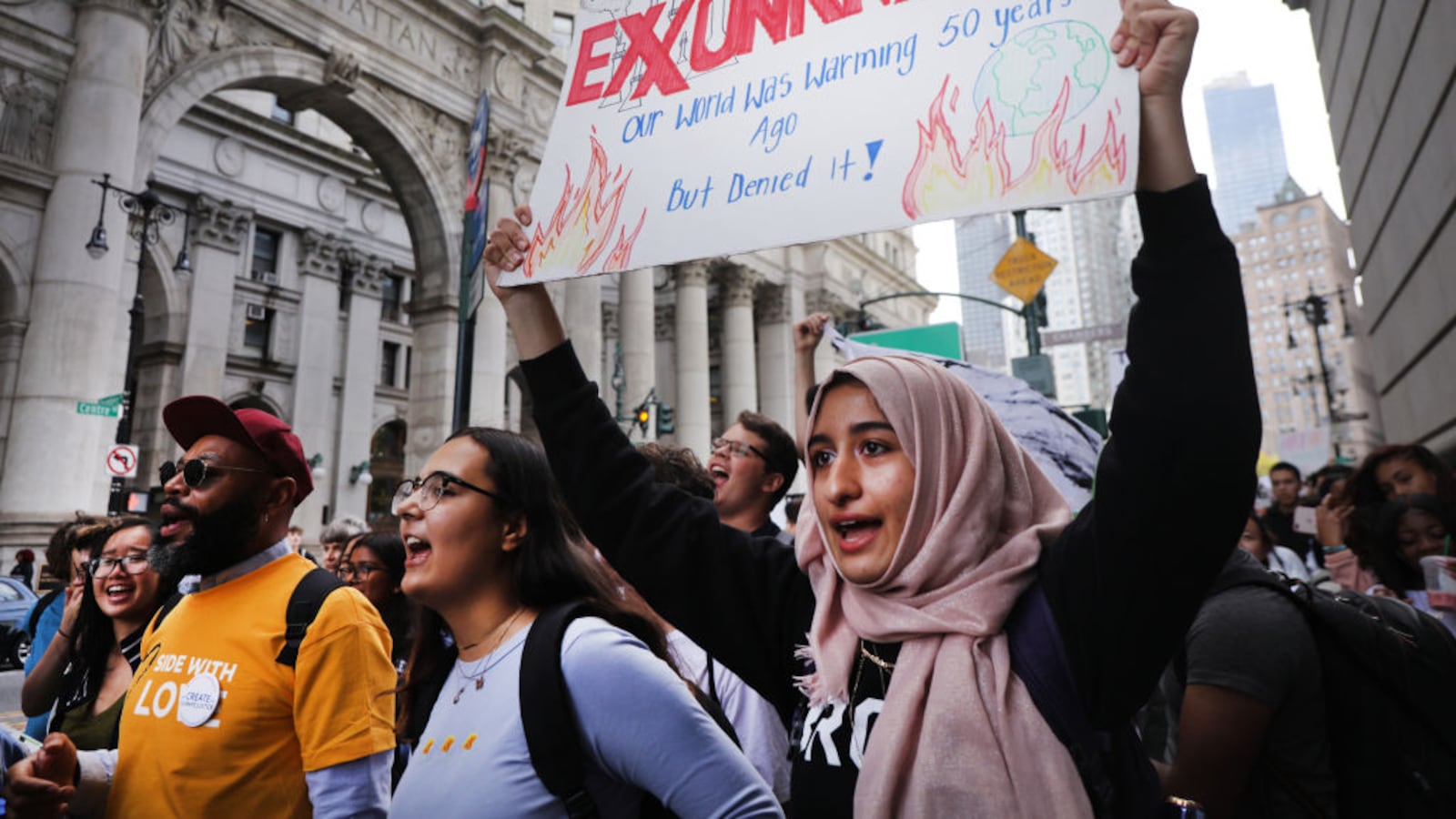 Students walk out of school to take part in a march to demand action on the global climate crisis on September 20, 2019 in New York City.
