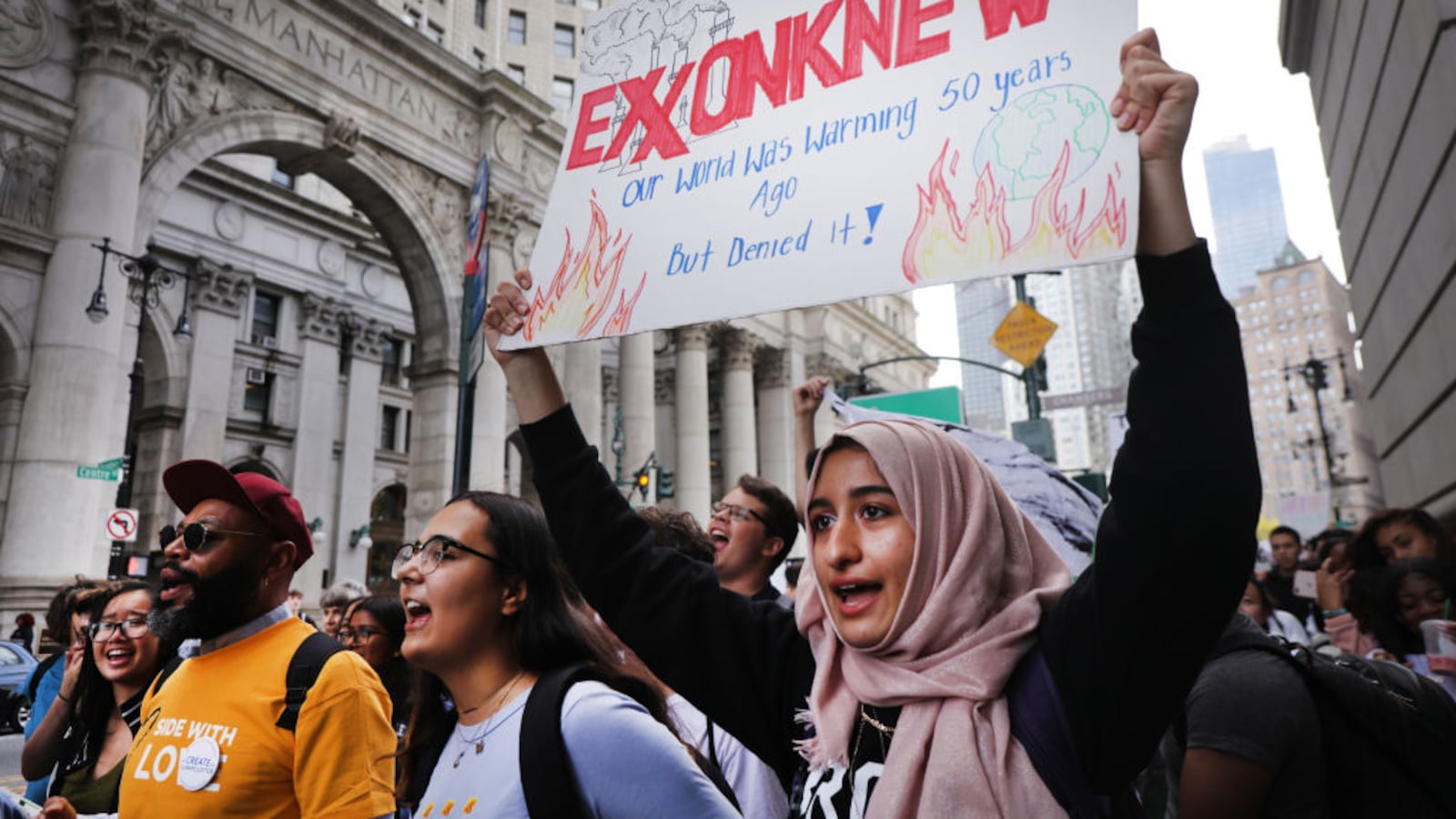 Students walk out of school to take part in a march to demand action on the global climate crisis on September 20, 2019 in New York City.