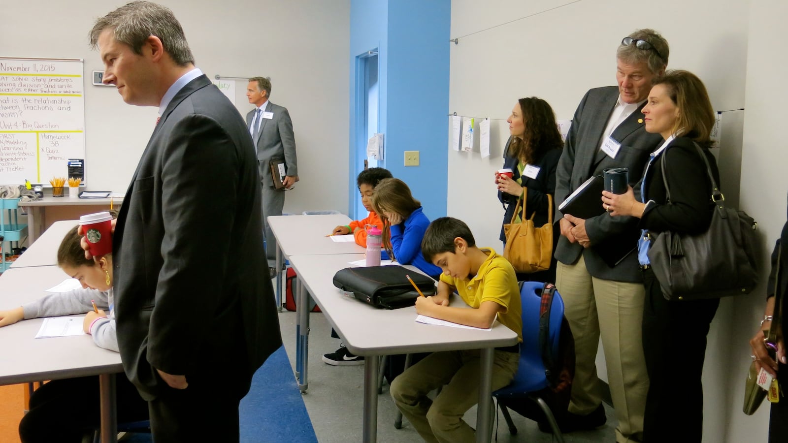 Sen. Jeff Yarbro observes a math class at Valor Voyager, one of the Valor Collegiate Academies on the same campus, with MNPS School Board member Mary Pierce and Councilman Russ Pulley looking on.