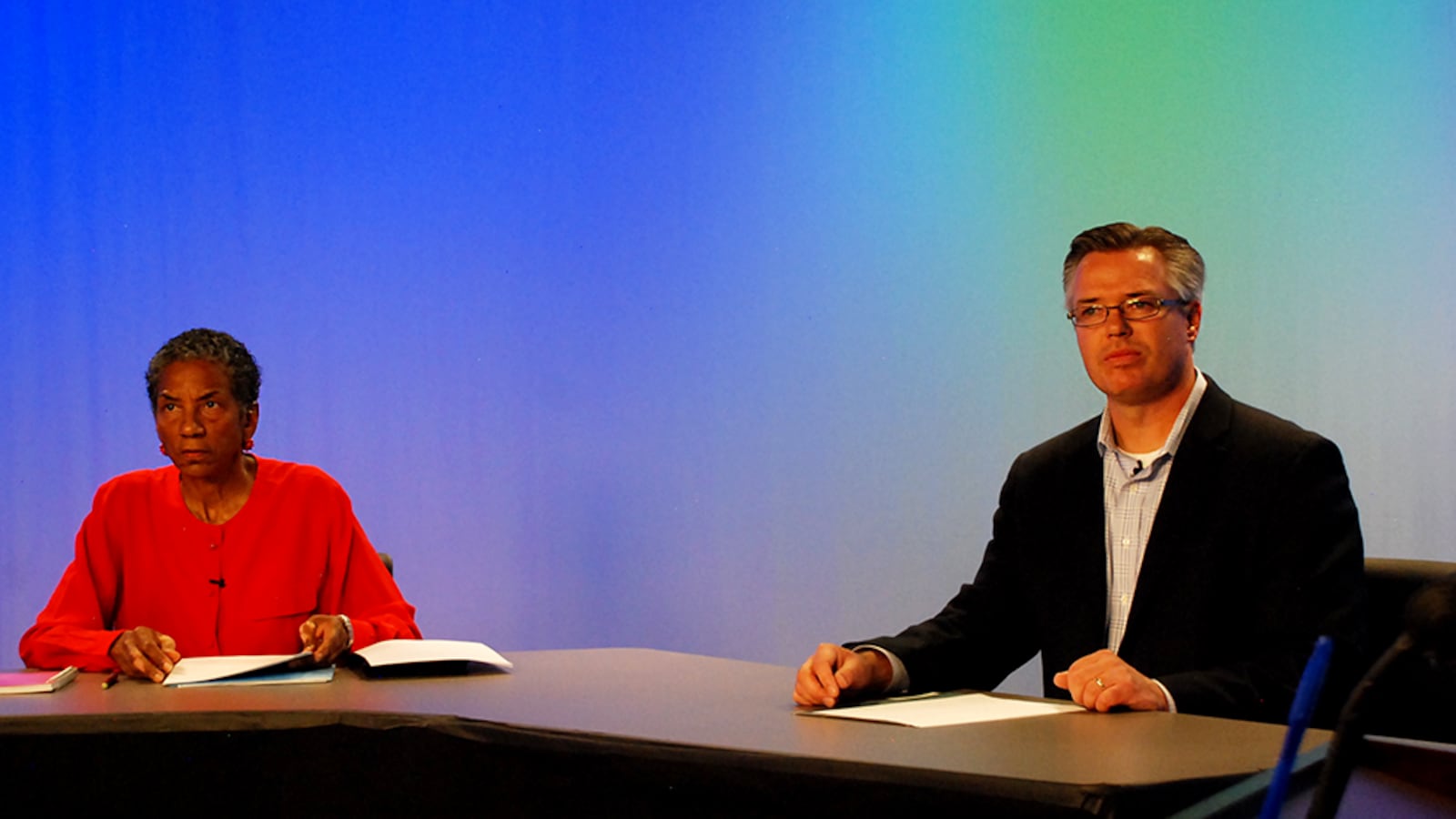 Denver school board President Happy Haynes and her challenger Robert Speth in a televised debate.