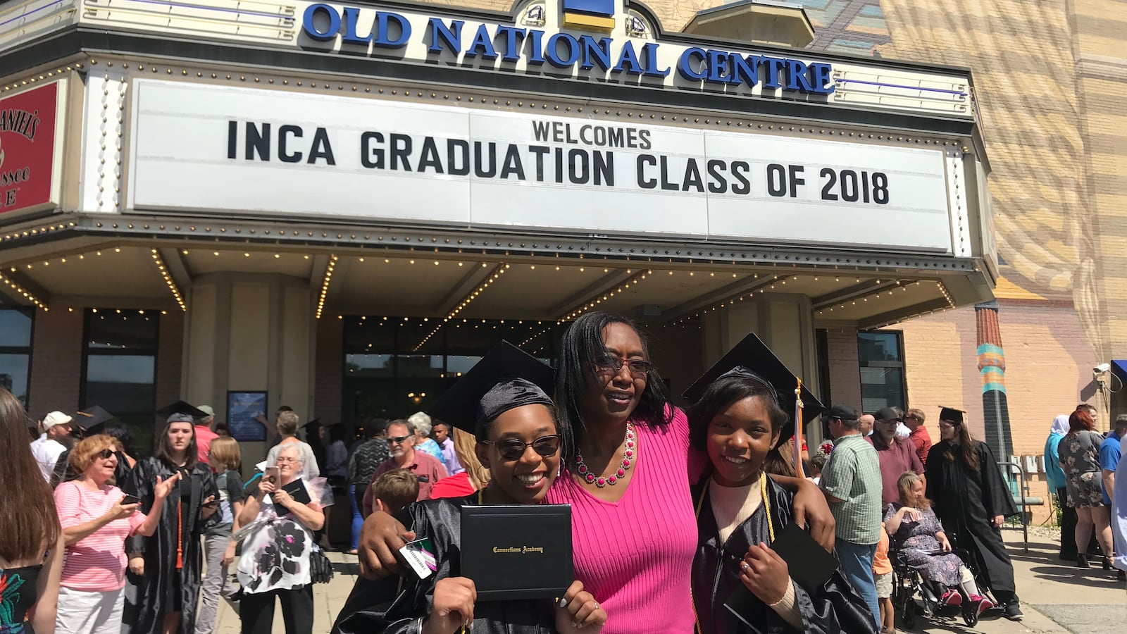 Angela Freel poses with her daughters, Dasani Freel and Cazariah Haskins, outside Old National Center. Dasani Freel and Haskins graduated Monday from Indiana Connections Academy.