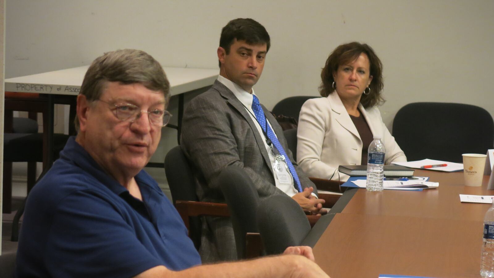 Rep. Harry Brooks (left) explains the legislature's rationale behind standardized testing as members of Tennessee's testing task force consider cutting more tests.