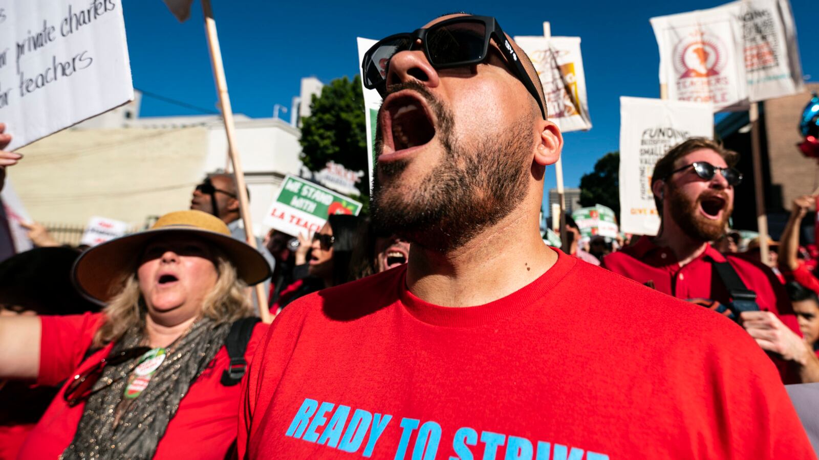 Teachers and supporters of public education march against education funding cuts during the March for Public Education in Los Angeles, California on December 15, 2018. The rally, organized by United Teachers Los Angeles, drew thousands of educators who demanded wage increases and smaller class sizes. (Photo by Ronen Tivony/NurPhoto via Getty Images)
