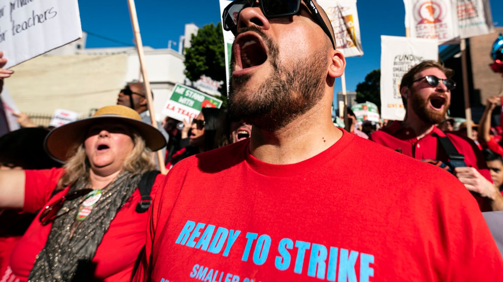 Teachers and supporters of public education march against education funding cuts during the March for Public Education in Los Angeles, California on December 15, 2018. The rally, organized by United Teachers Los Angeles, drew thousands of educators who demanded wage increases and smaller class sizes. (Photo by Ronen Tivony/NurPhoto via Getty Images)