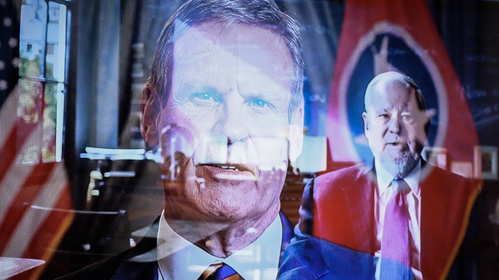 An in-camera double exposure of Tennessee Governor Bill Lee and Hillsdale College President Larry Arnn.