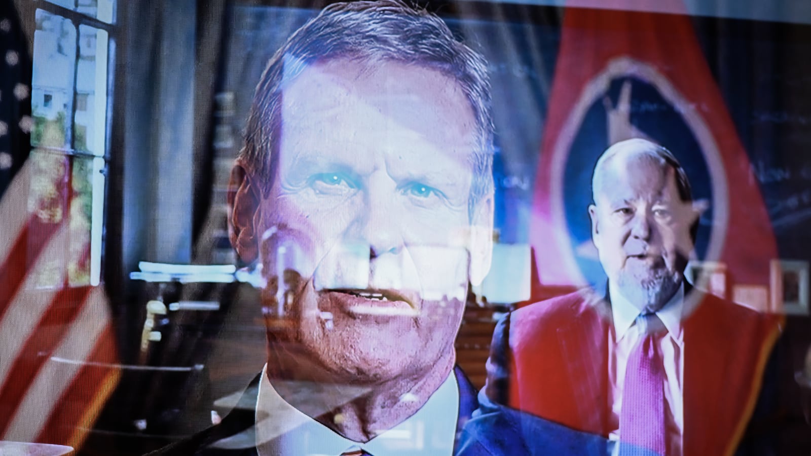 An in-camera double exposure of Tennessee Governor Bill Lee and Hillsdale College President Larry Arnn.