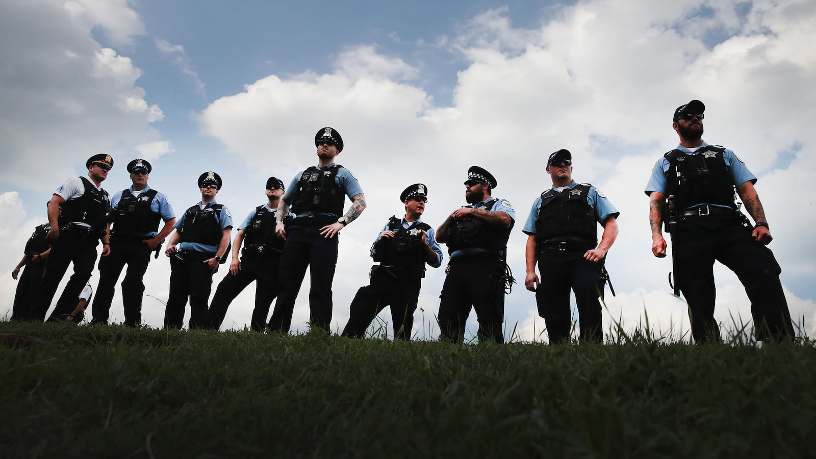 Police officers stand alongside Lake Shore Drive in August as protesters decry violence and lack of investment in African-American neighborhoods and schools