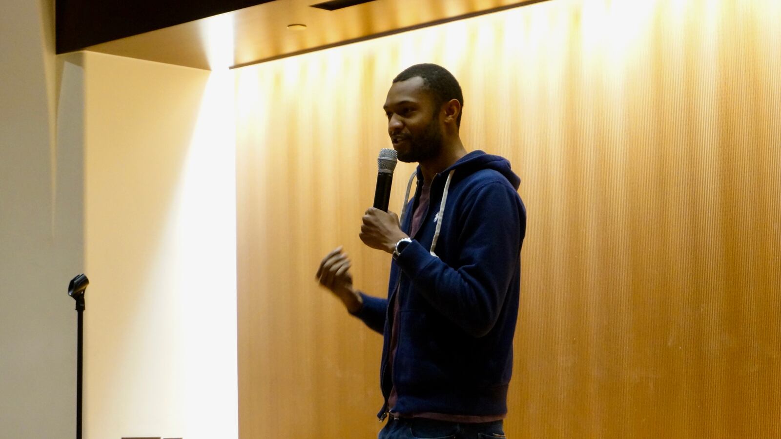 Andrew Pillow, a teacher at KIPP Indy College Prep Middle School, tells a story at a story slam co-hosted by the Eiteljorg Museum of American Indians and Western Art, Chalkbeat Indiana, and Teachers Lounge Indy.