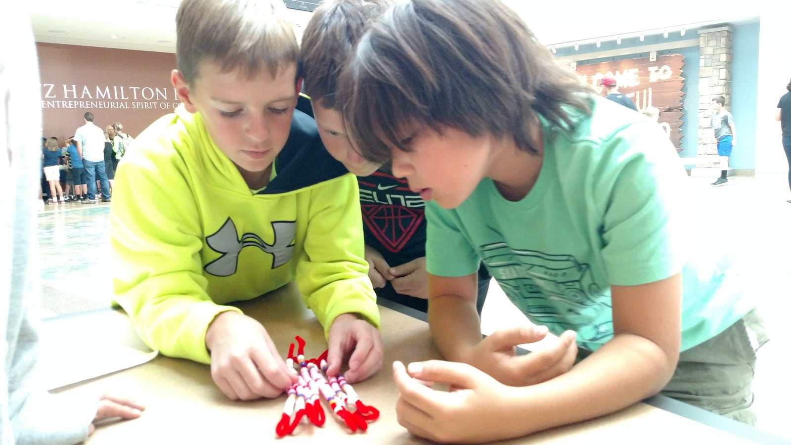 Students from a Fort Collins elementary school learn math through beadwork (photo by Eric Gorski).