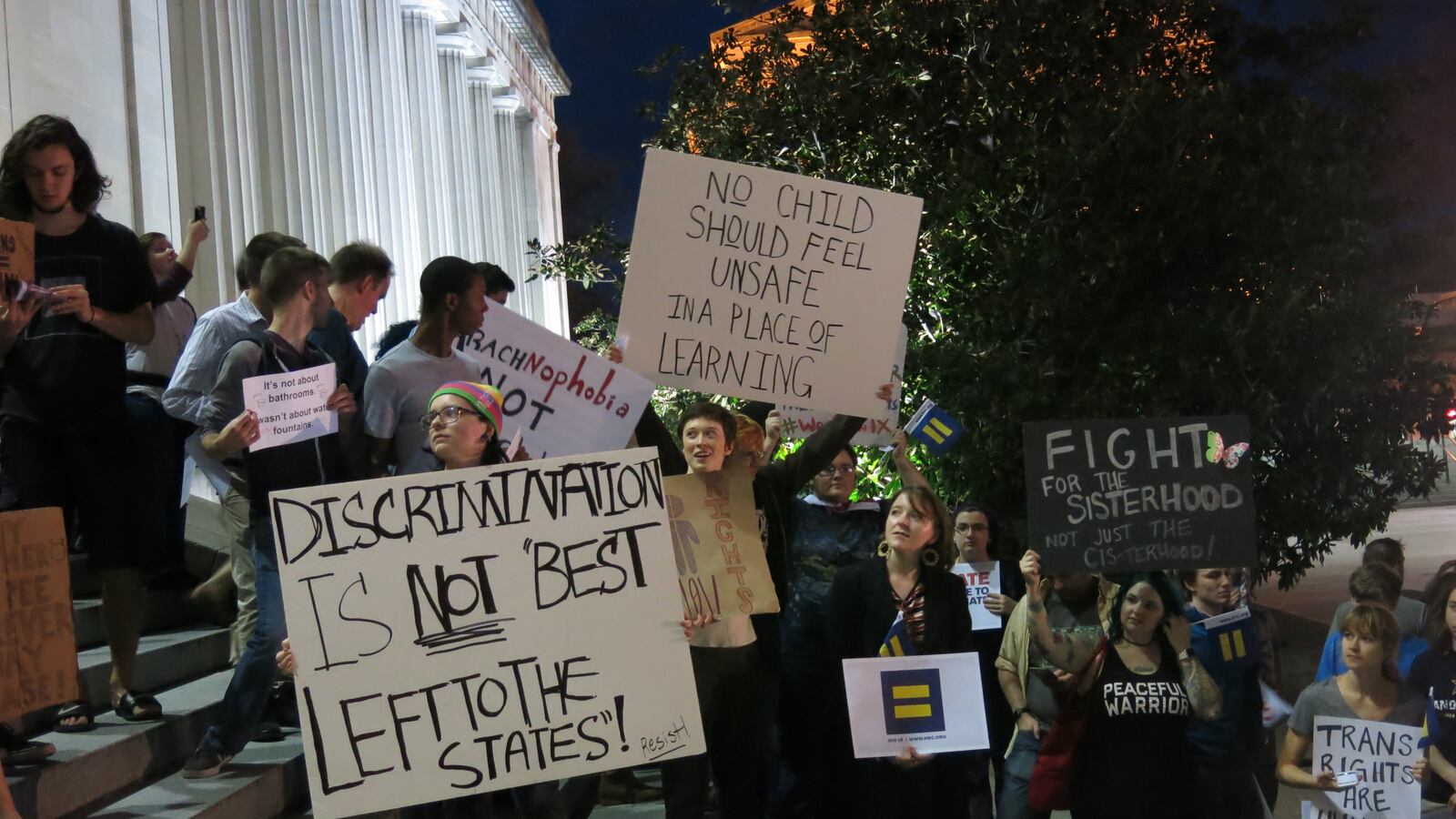 Protestors attended a rally in support of the state's transgender students at the state Capitol.