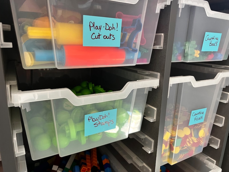 Plastic containers of supplies.