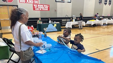 Detroiters have family fun while getting health care information and dental checkups at free back-to-school event