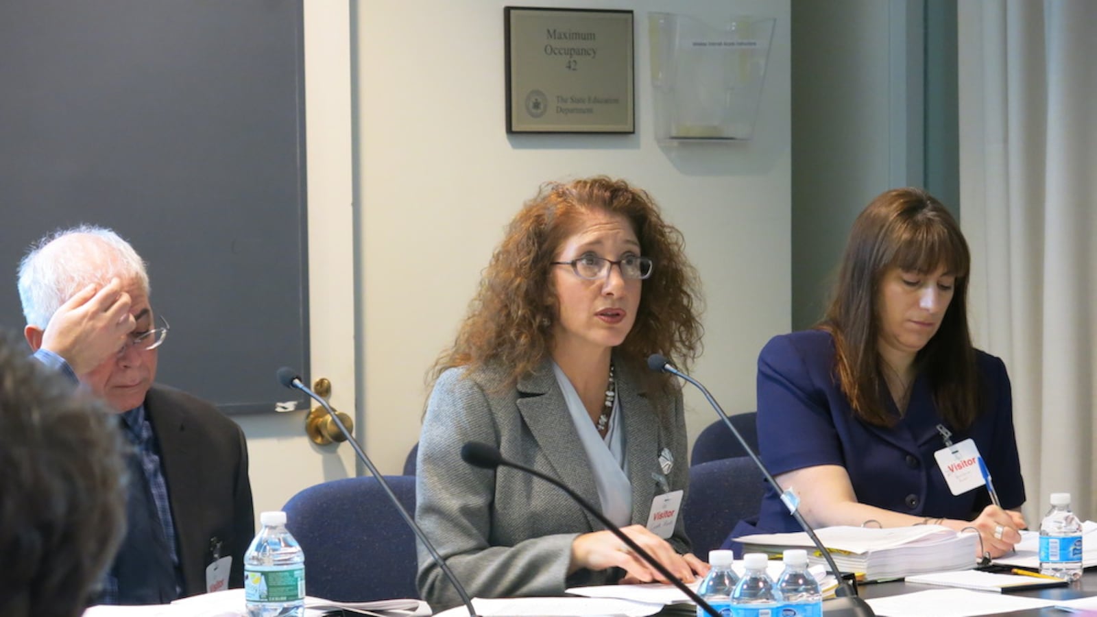 Laura Feijoo, a senior superintendent in the department’s Office of School Support, presents to the Board of Regents.
