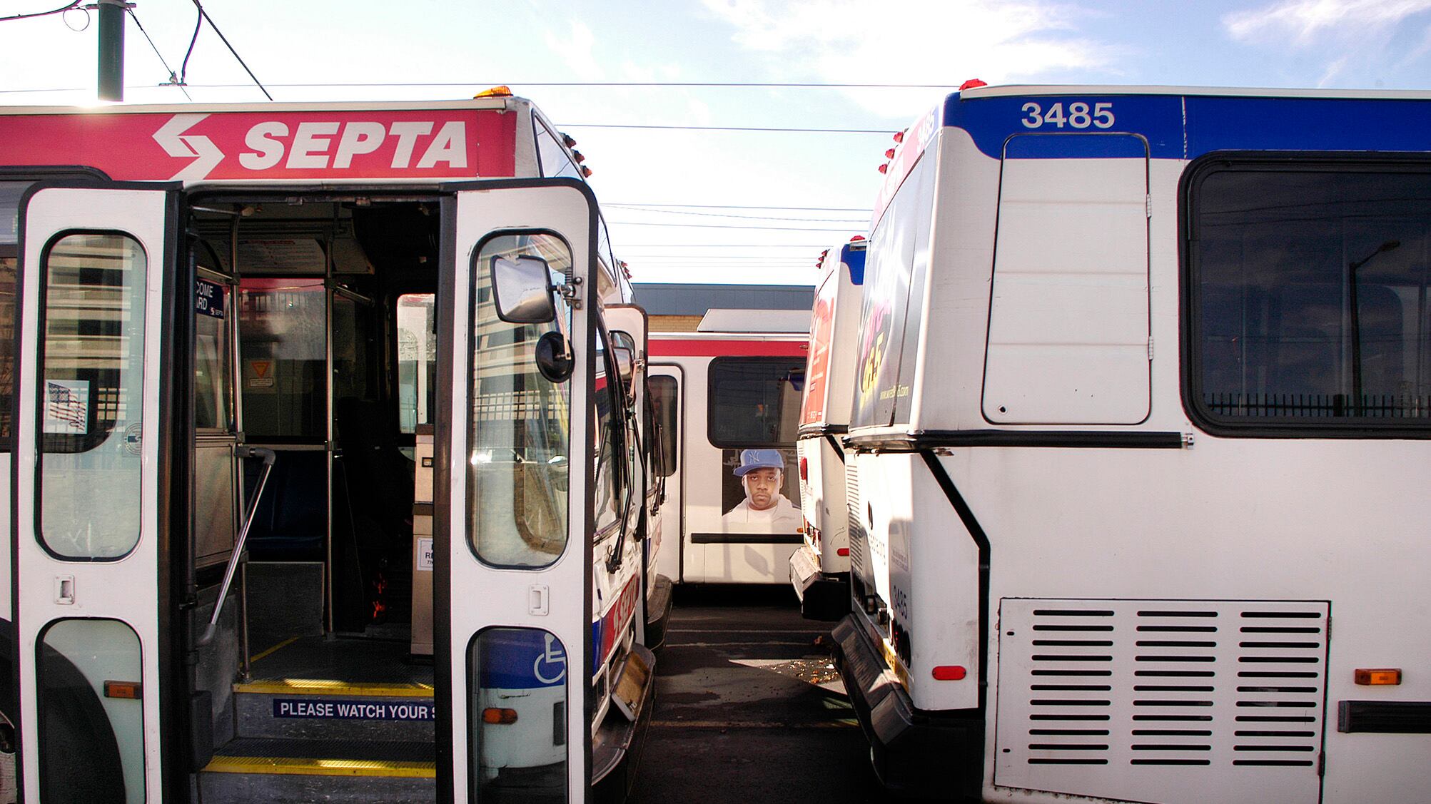 Several SEPTA buses line up with doors open