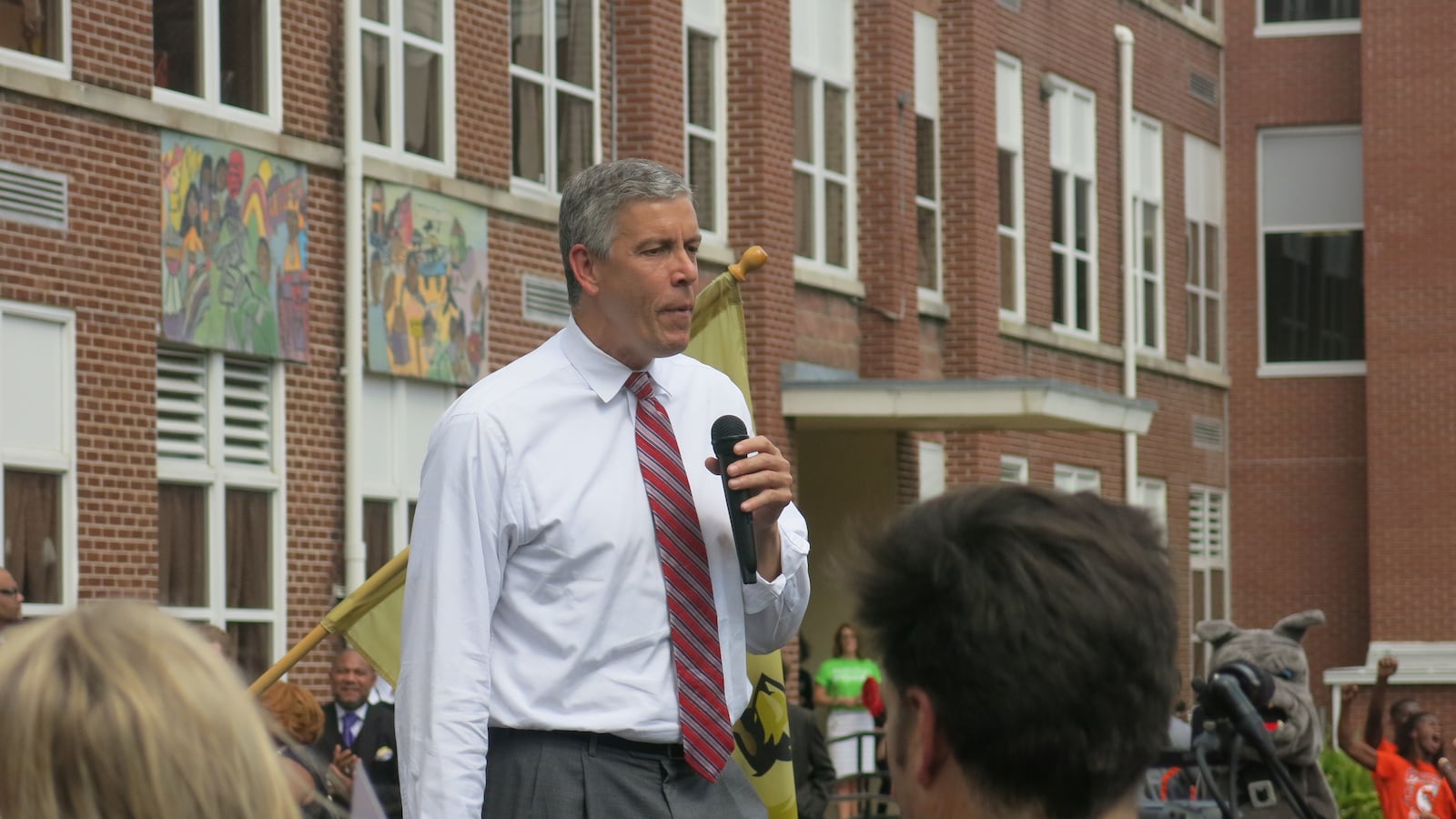 Education Secretary Arne Duncan addresses the crowd outside Cornerstone, formerly Lester Elementary, in Binghamton.
