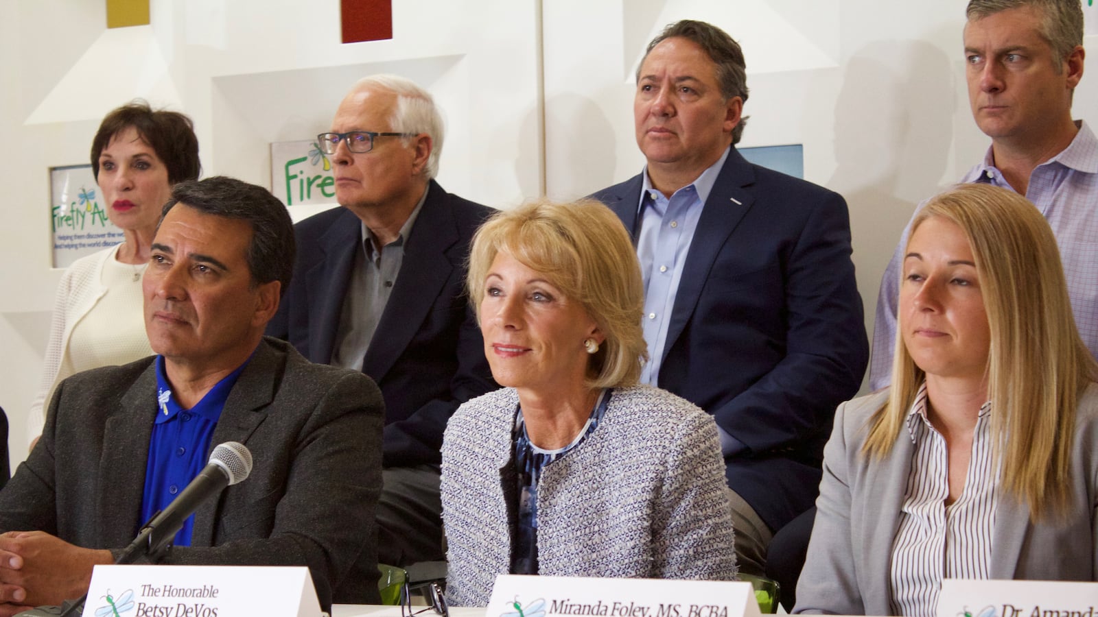 Betsy DeVos, center, at Denver's Firefly Autism House.