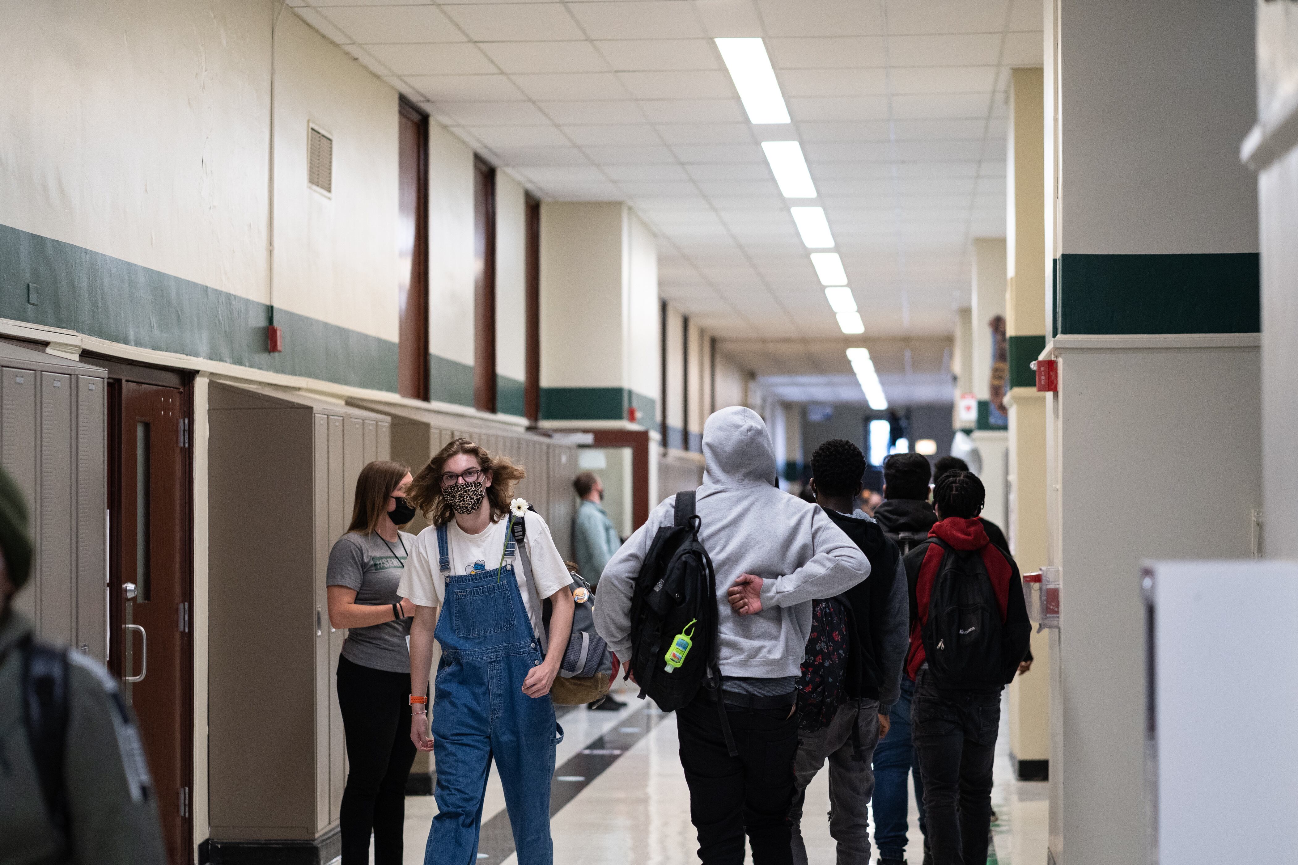 Students walk the halls of Senn High School on the first week back to classrooms on April 23, 2021.