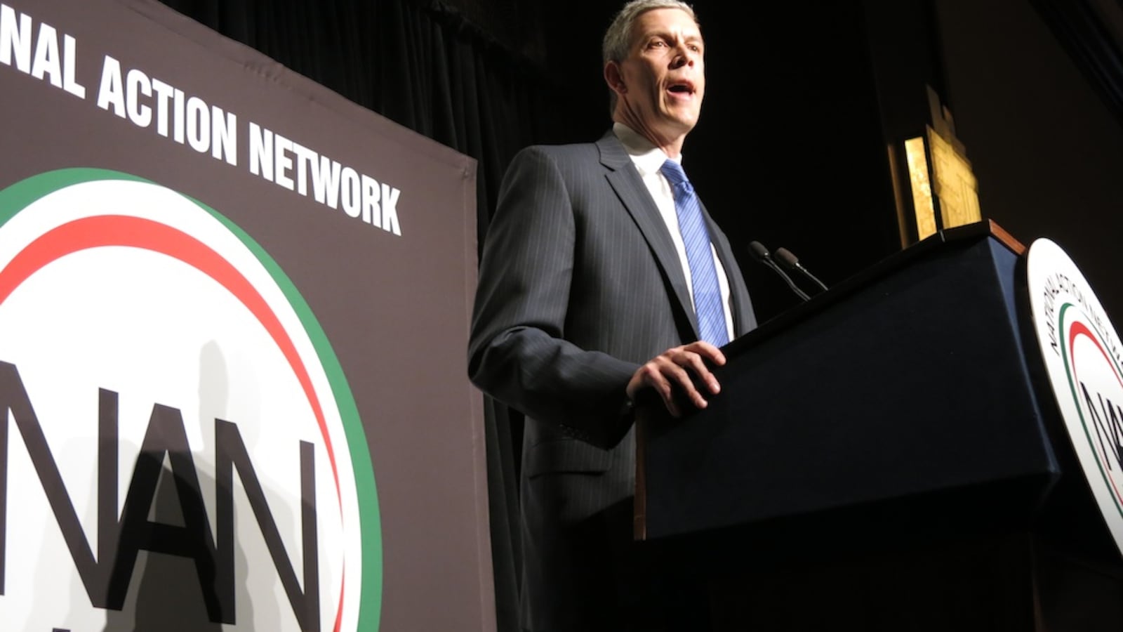 Arne Duncan speaking at Al Sharpton's National Action Network conference in 2014.
