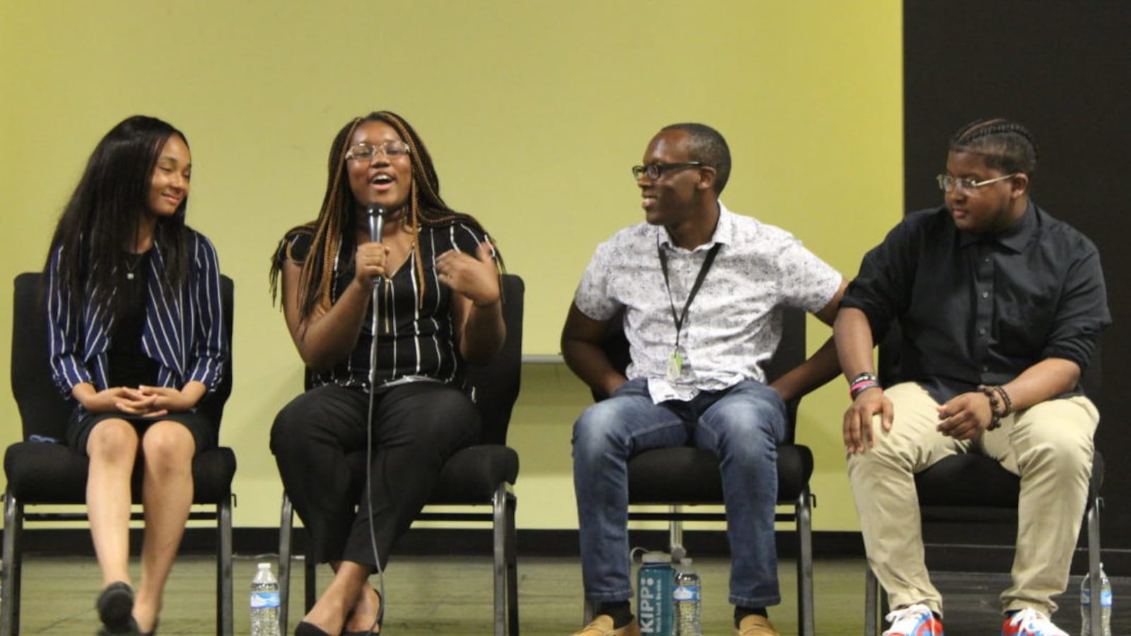 Freedom Prep student Destiny Dangerfield talks alongside Asiah Hayes, Detario Yancey, and Evan Walsh at a panel discussion for TFA Memphis trainees.