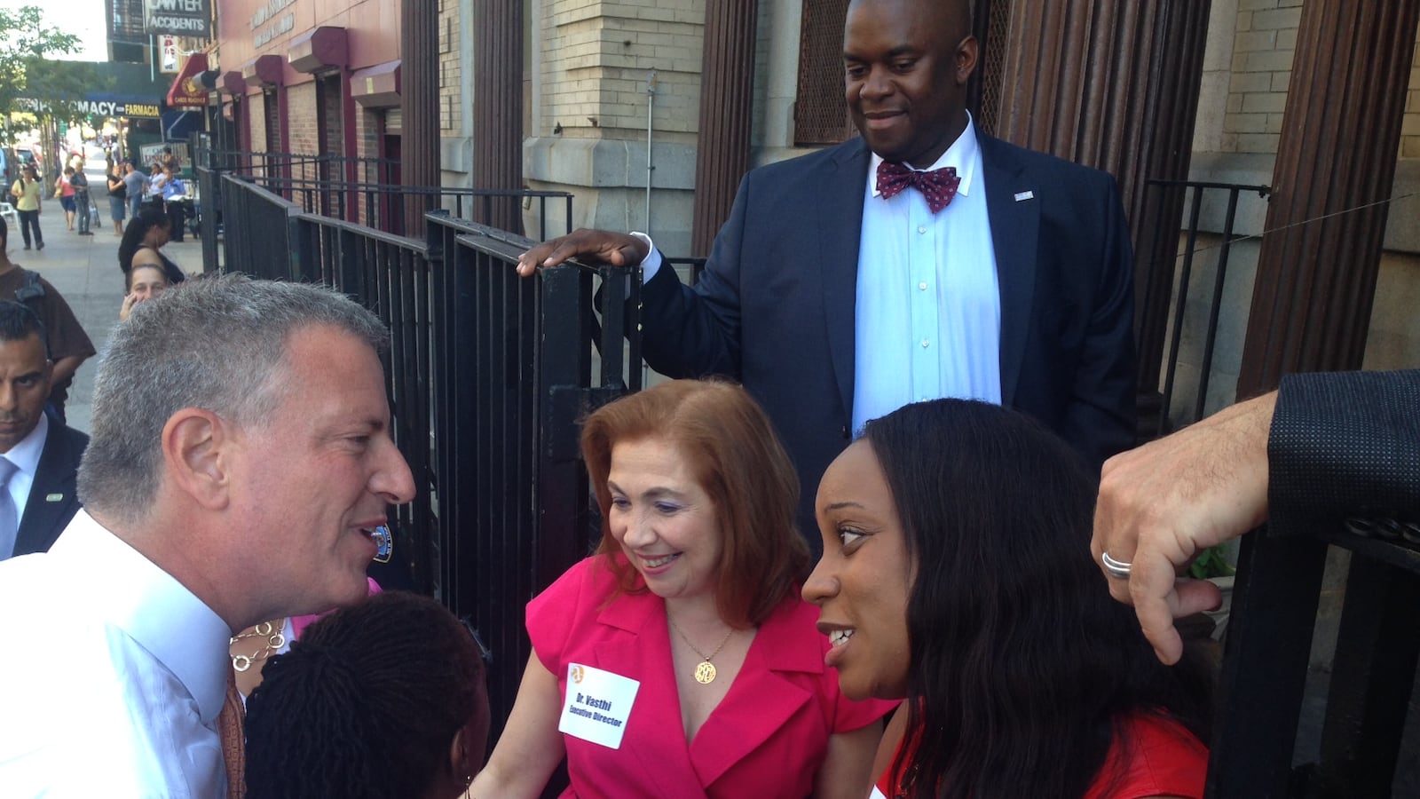 Staff from Amber Charter School greet Mayor Bill de Blasio on a visit in September.