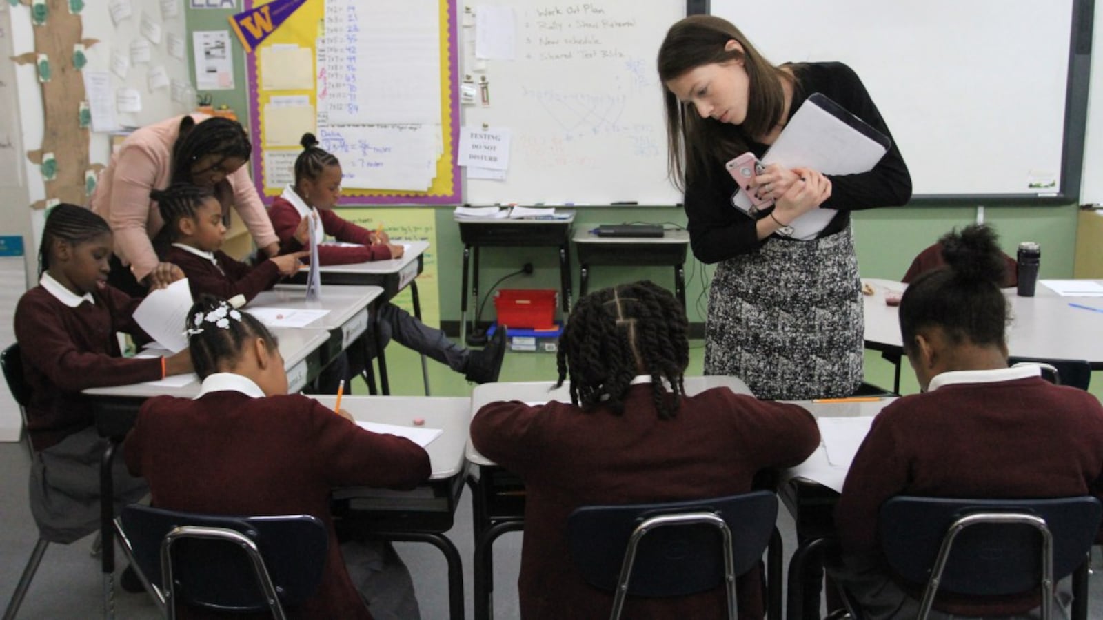 Erica Murphy, school director of Brownsville Ascend Lower Charter School in New York, oversees students in a fourth-grade English class.