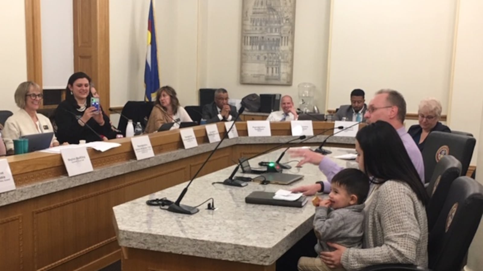 Sabrina Suarez brought her son to advocate for her charter school, which serves young parents and their children.