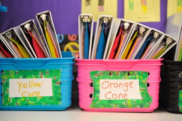 Boxes full of school binders.