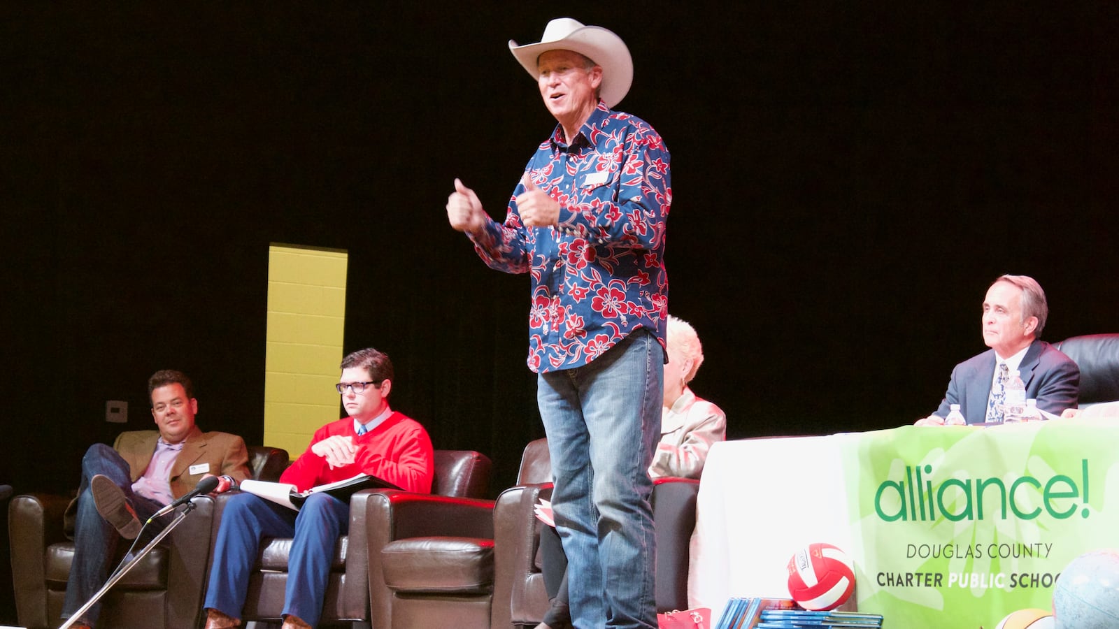 Randy Mills, a member of the Elevate slate, addresses a crowd of Douglas County voters at a candidate forum. (Photo by Nic Garcia)