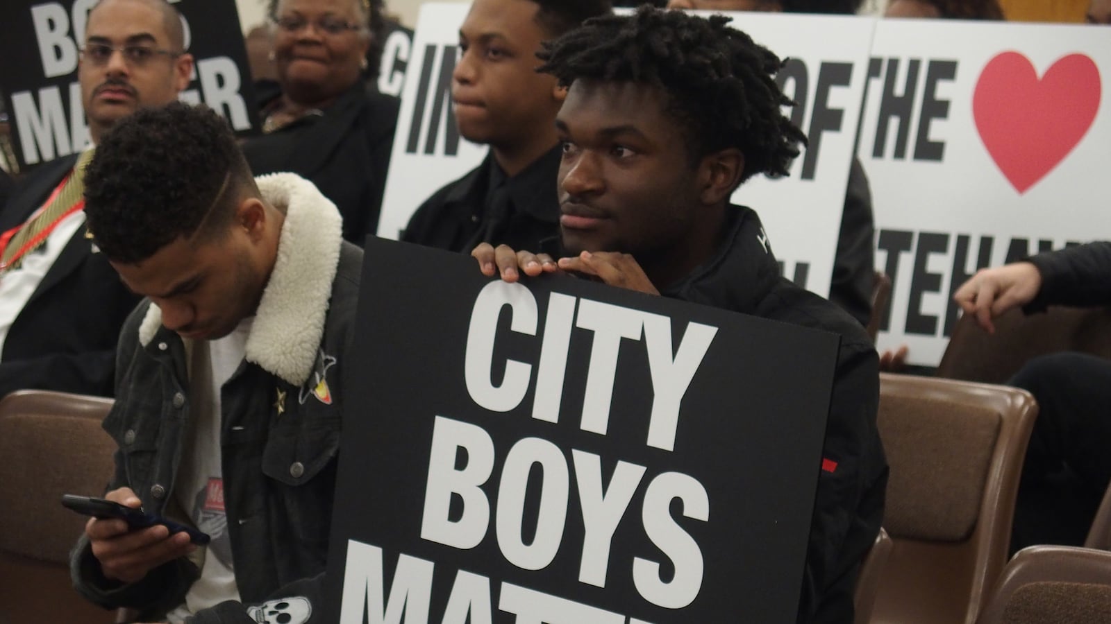 About 40 parents, students, and supporters of City University Boys Preparatory asked the Shelby County Schools board to keep the school open.