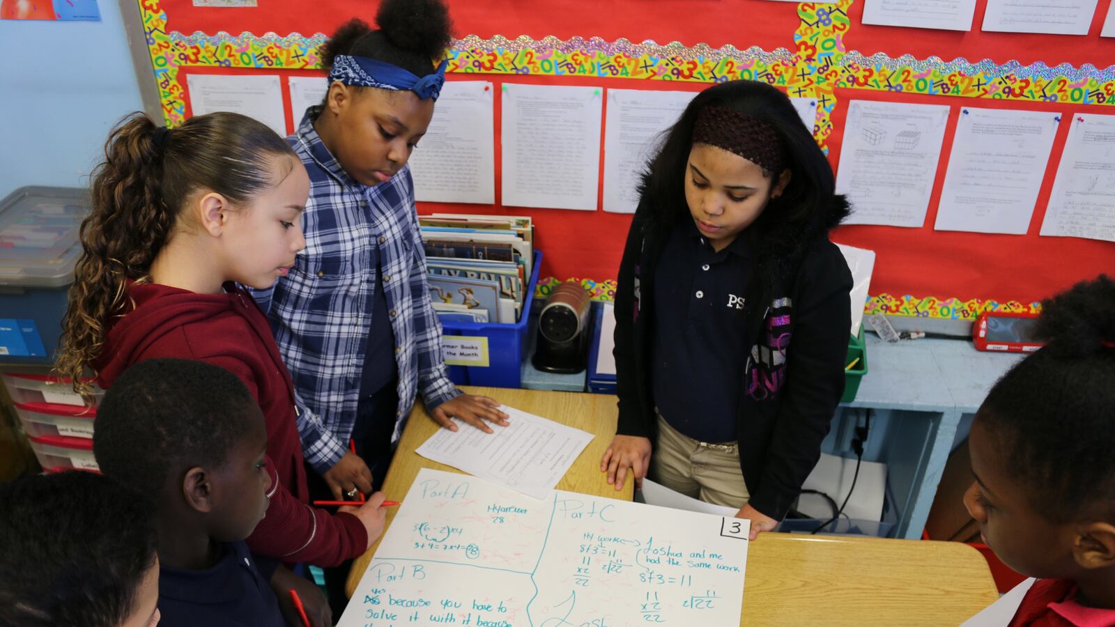 Fifth-grade students at P.S. 294 in the Bronx were immersed in math problems when Chalkbeat reporter Christina Veiga visited in March.