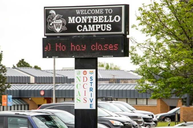 Welcome to Montbello Campus reads a sign above the electronic billboard on the previous campus of the comprehensive high school in Denver.