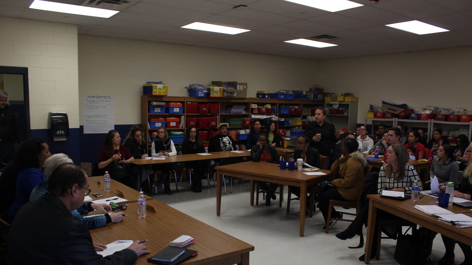 A school board meeting at the Southwest Detroit Community School.