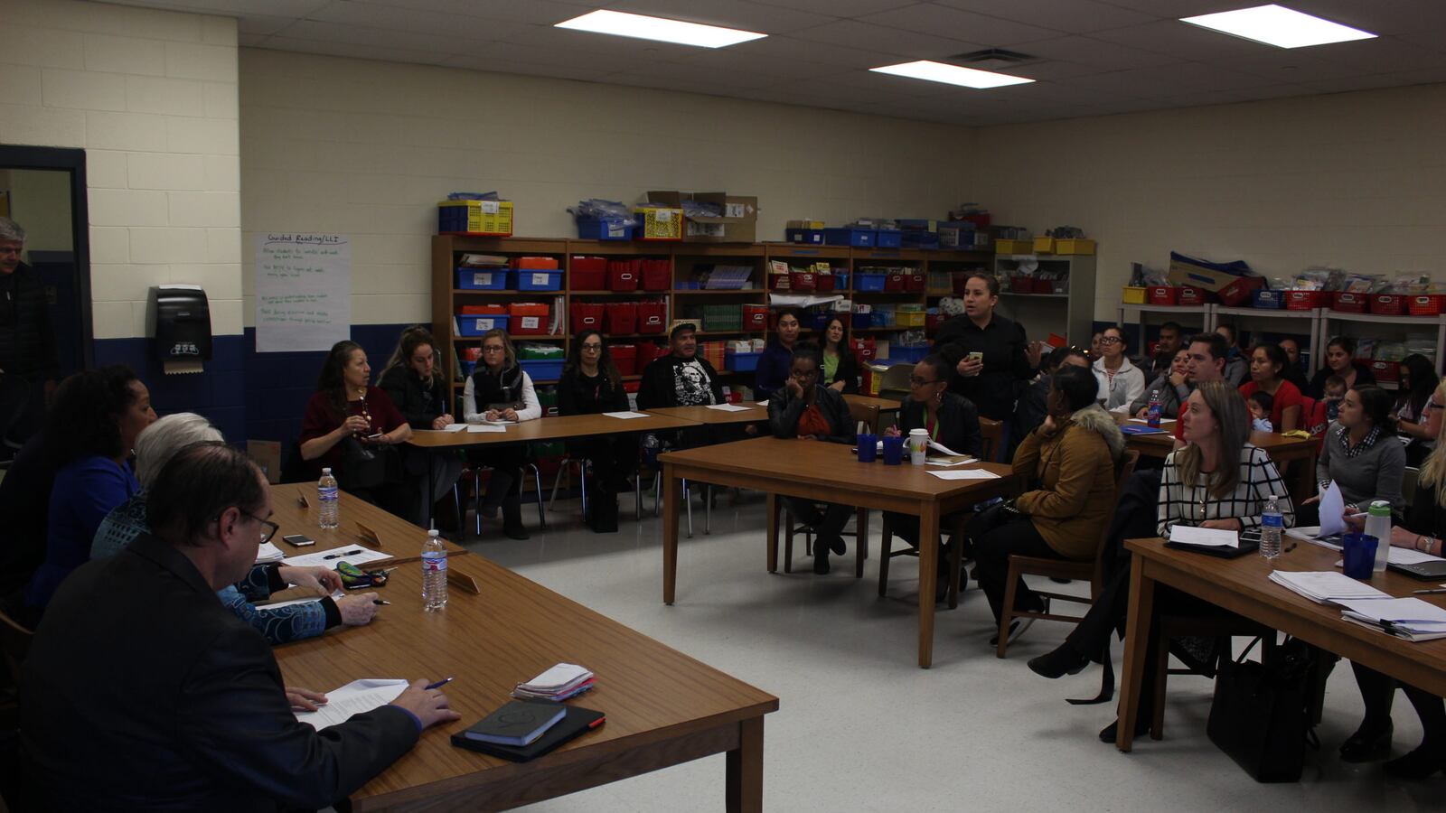 A school board meeting at the Southwest Detroit Community School.