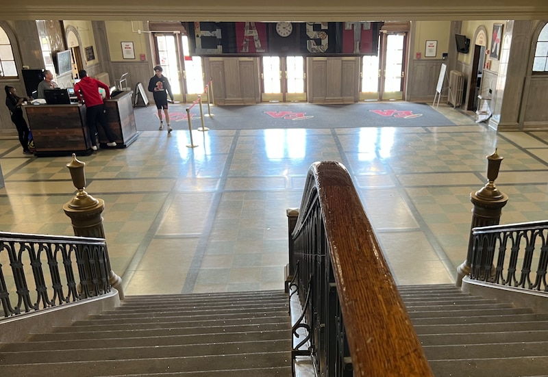 A photograph of the front entrance of a high school from inside the building.