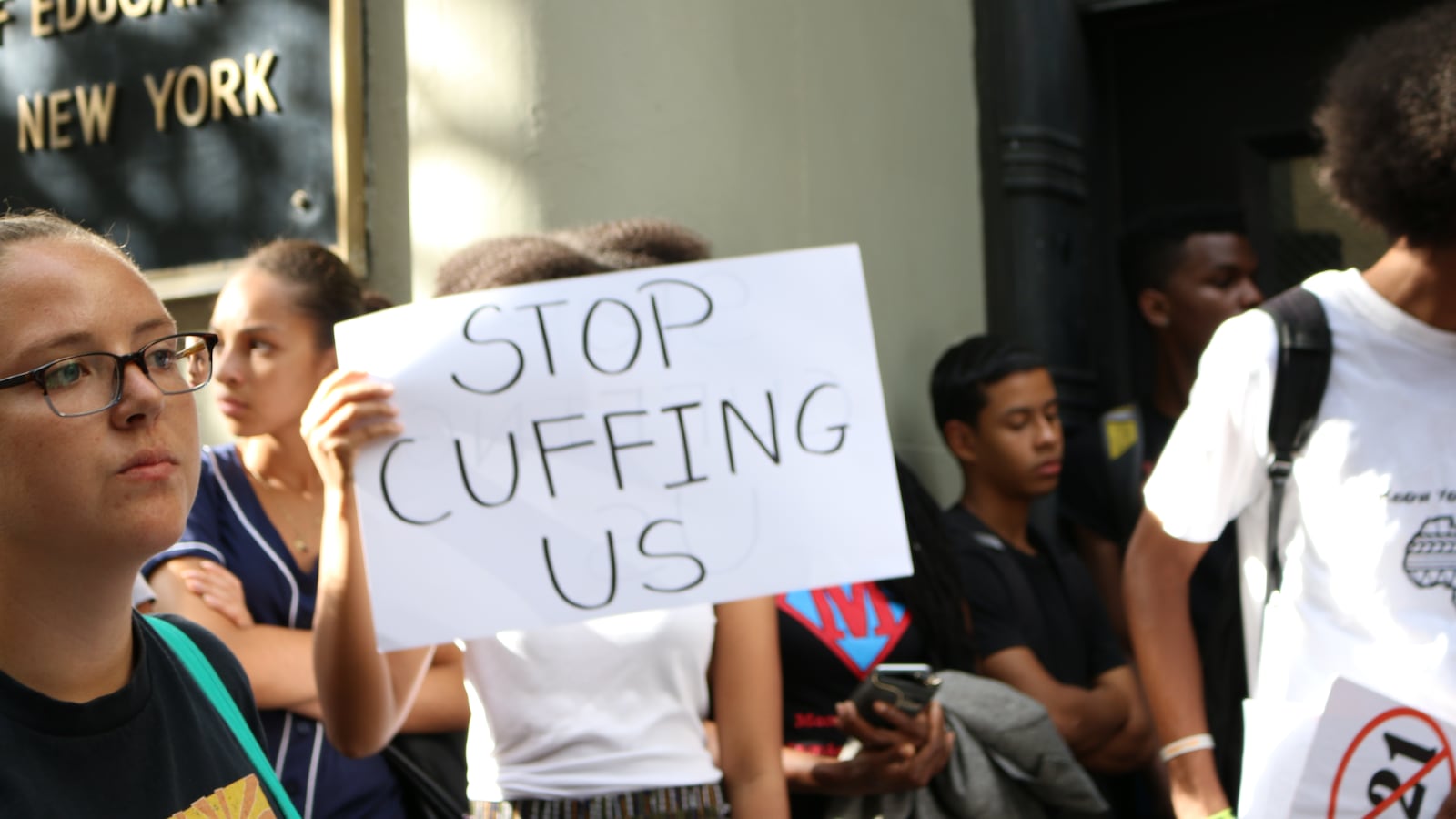 Advocates protest school suspension policies.