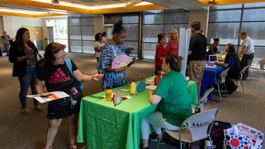 Higher pay and free training: A Colorado district’s pitch to applicants at back-to-school job fair