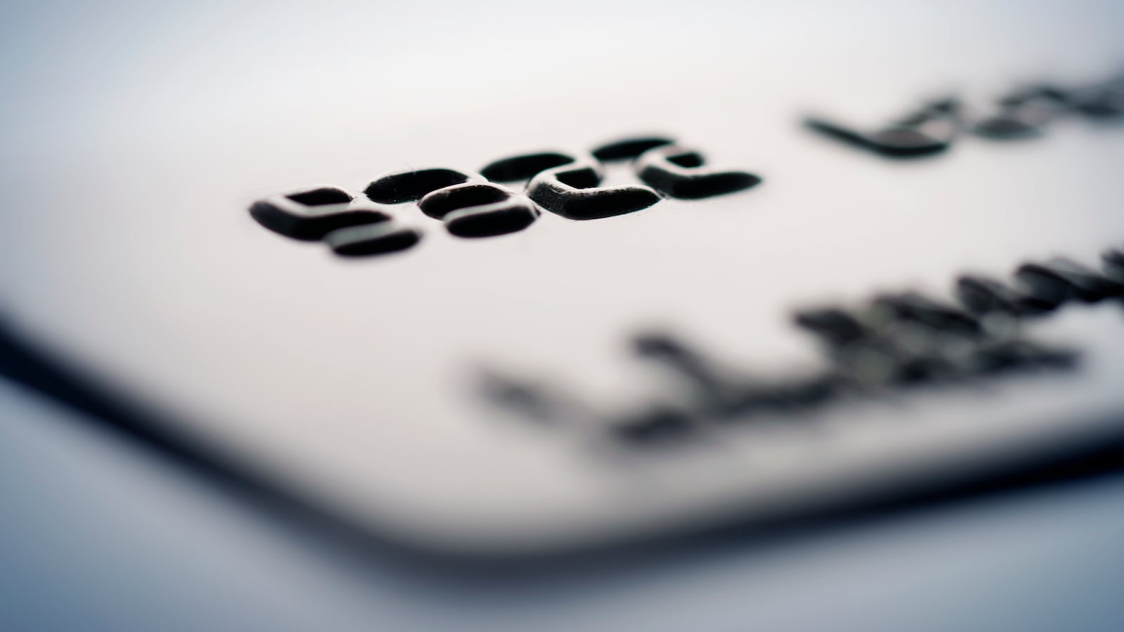 Close-up photo of a grey credit card.