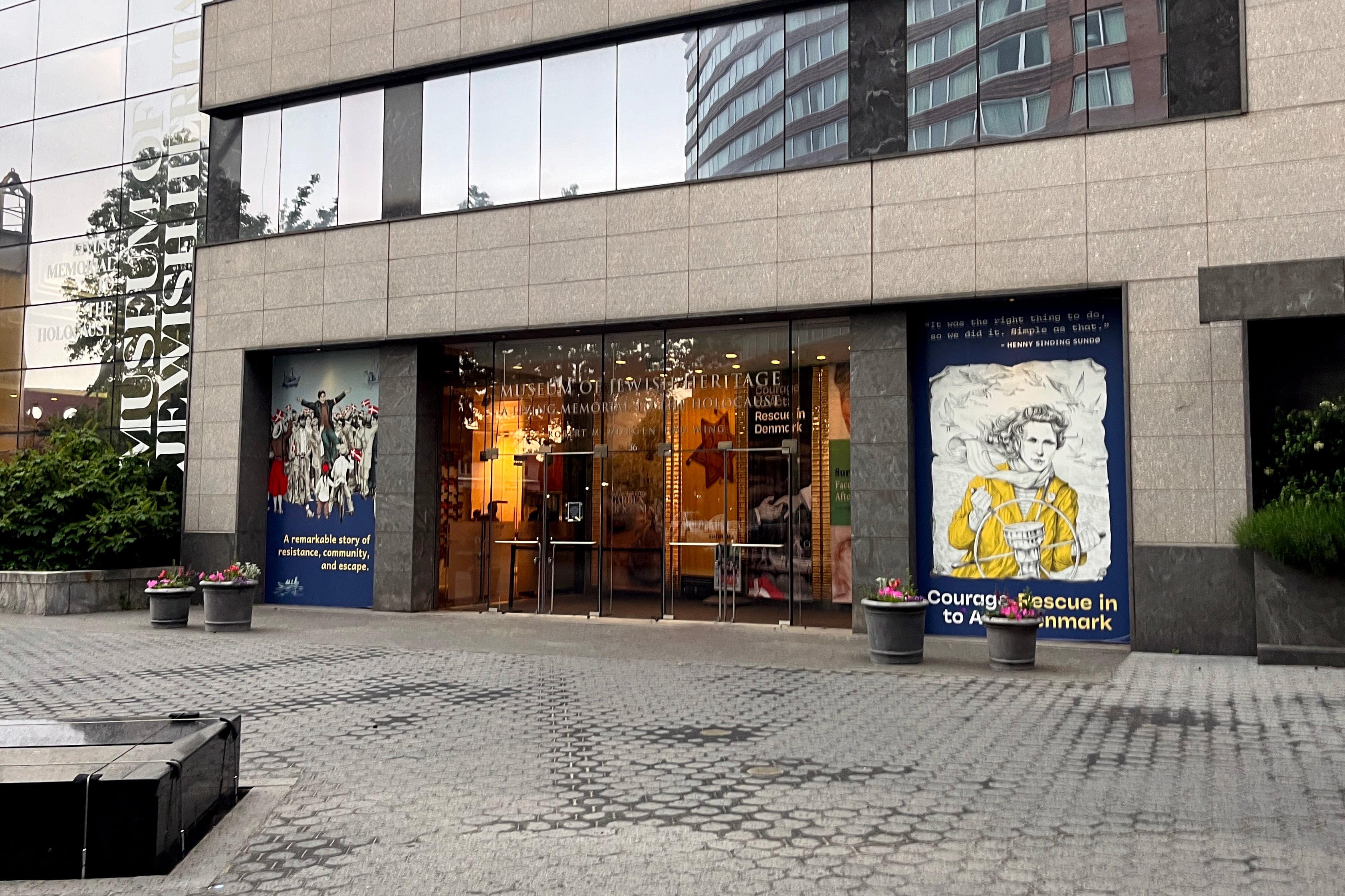 A large stone and glass building.