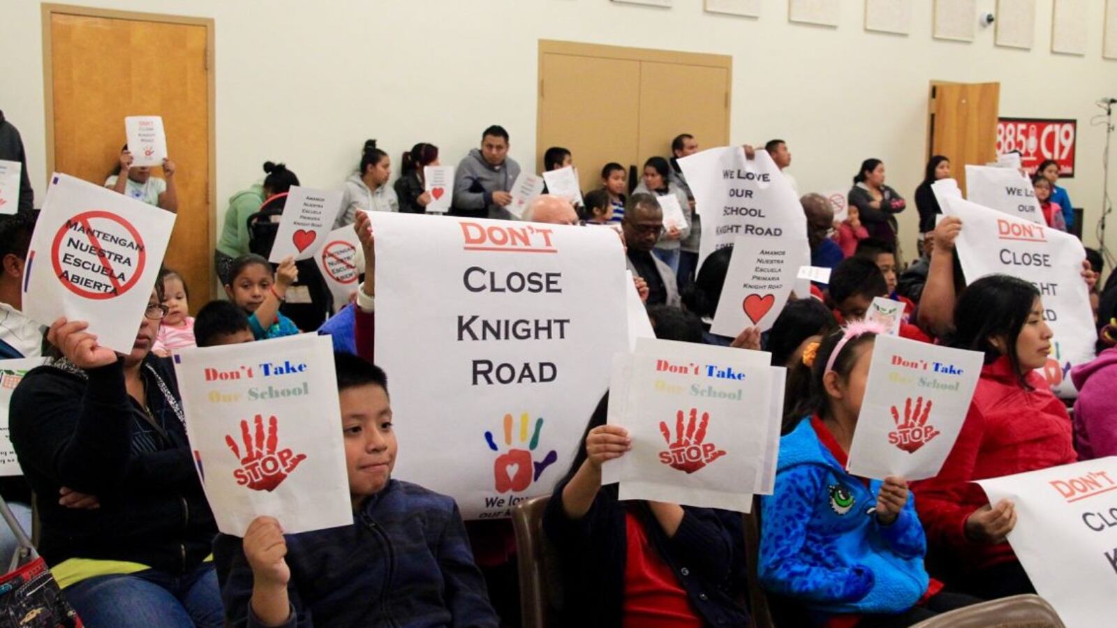 Parents and students from Knight Road Elementary School protest a proposal that would shutter their school during a board meeting for Shelby County Schools.