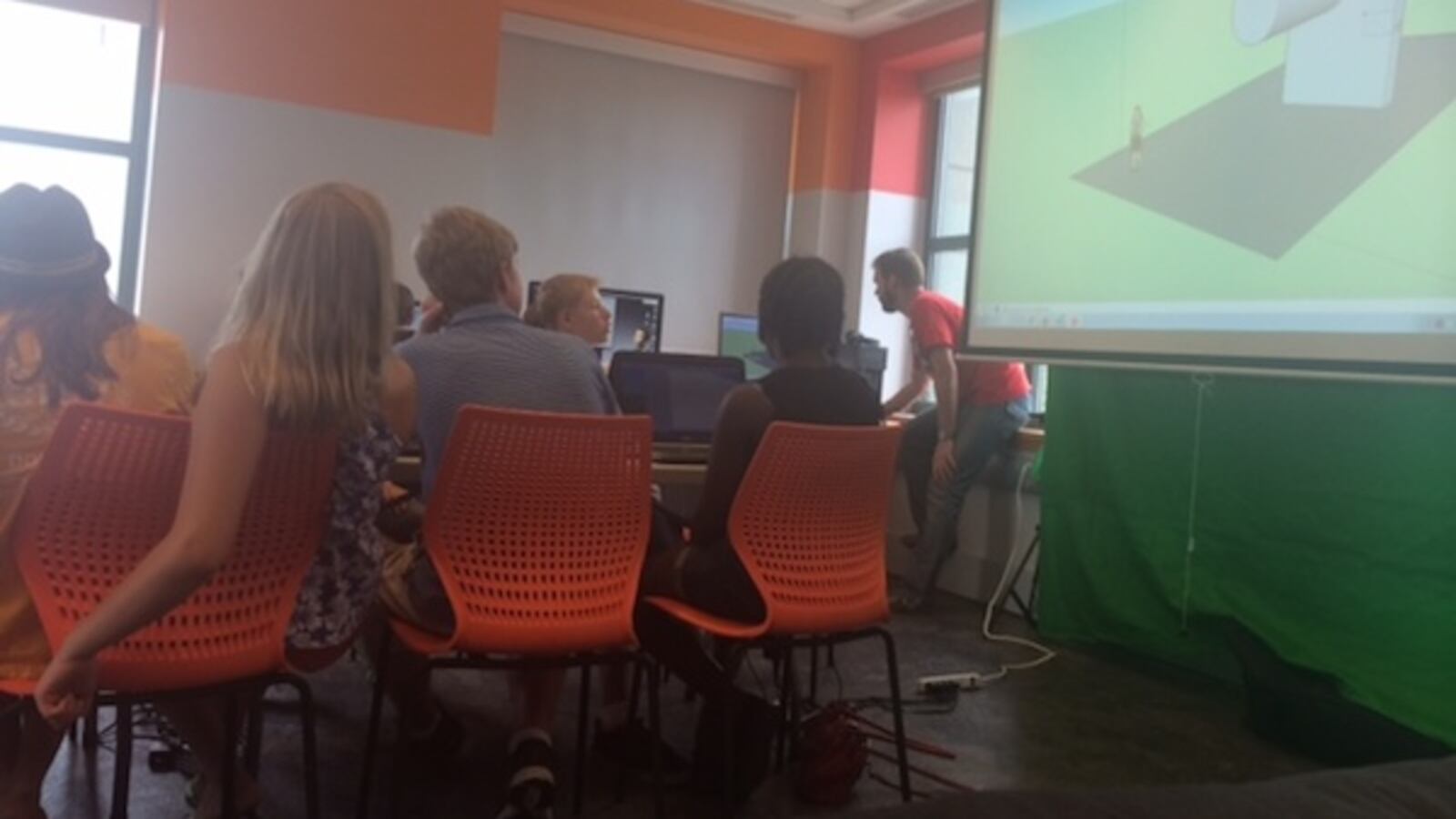Students listen in Denver Public Library's IdeaLAB.