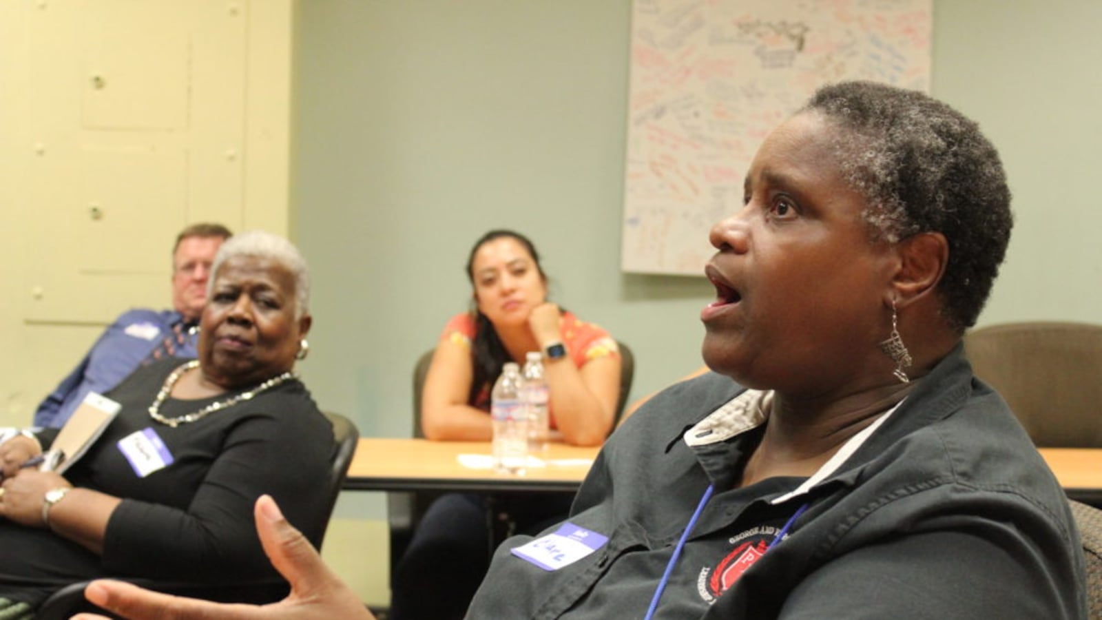 Attendees listen to Clare Pope speak at a 2019 Listening Tour session in Indianapolis.