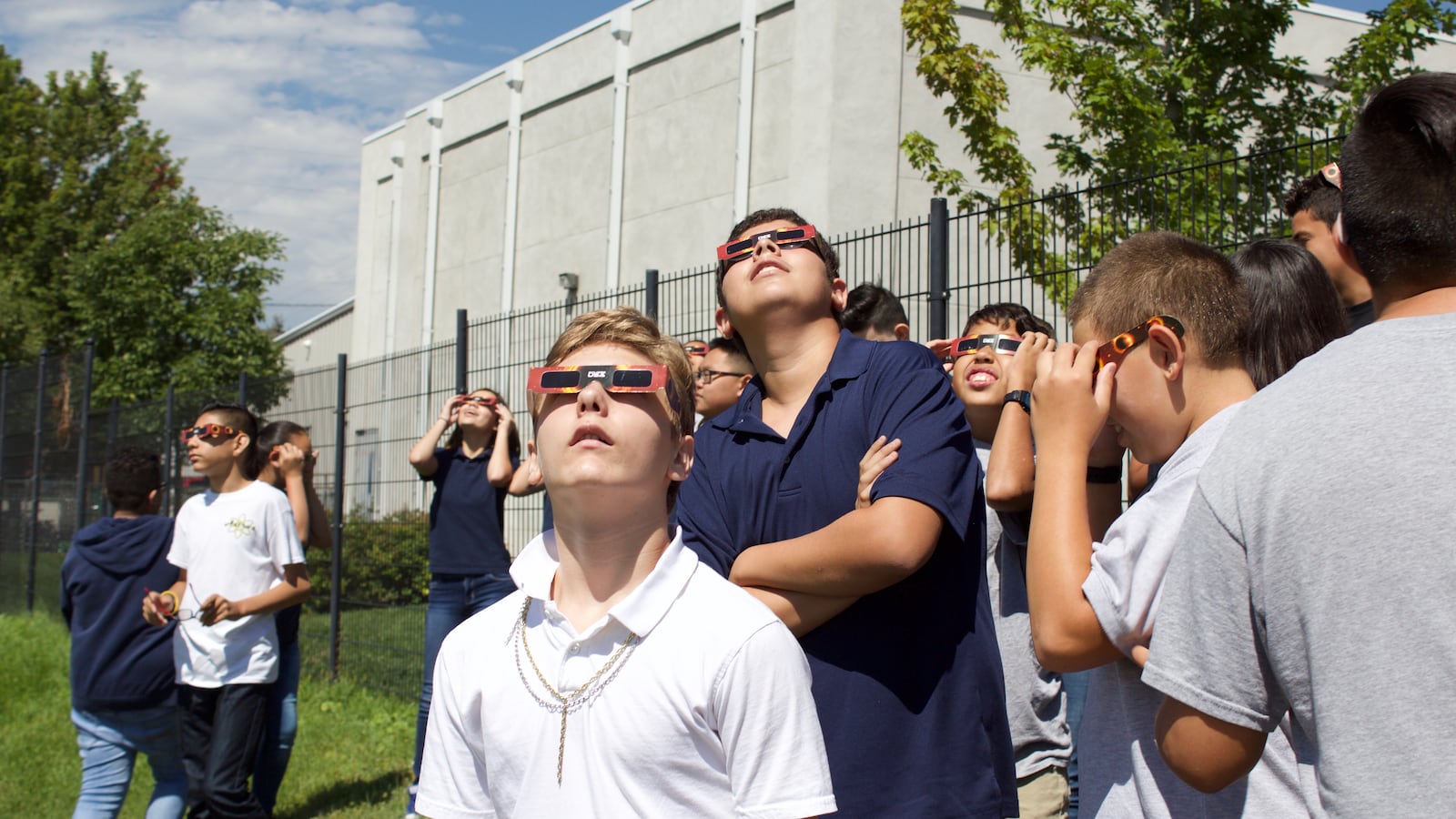 Students at Scott Carpenter Middle School take in the total solar eclipse. (Photo by Marissa Page/Chalkbeat)