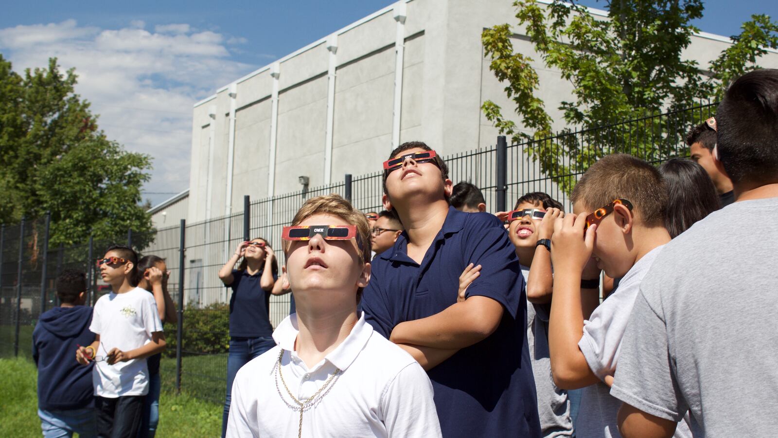 Students at Scott Carpenter Middle School take in the total solar eclipse. (Photo by Marissa Page/Chalkbeat)