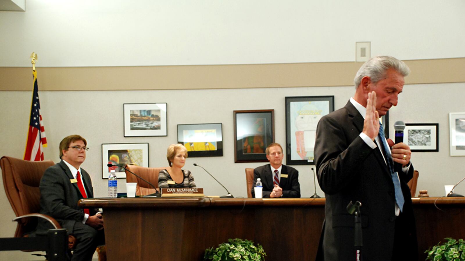 Ron Mitchell, right, takes the oath of office for the Jefferson County school board in 2015.
