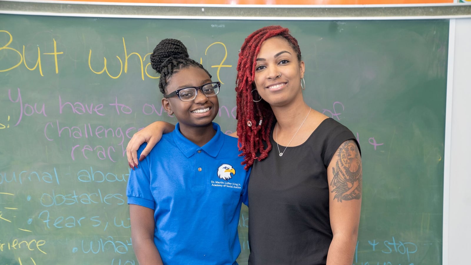 Communities in Schools site coordinator Artesha Williams and student Nasje Adams at the King Academy of Social Justice in Chicago