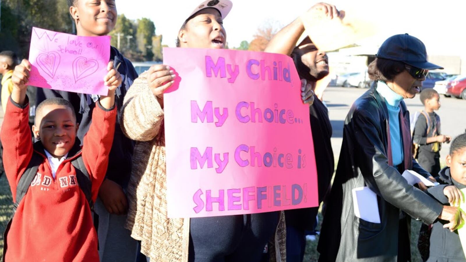 Parents and students at Sheffield Elementary School protest the state's proposal to take control of the Memphis school and convert it to a charter school managed by Aspire Public Schools.