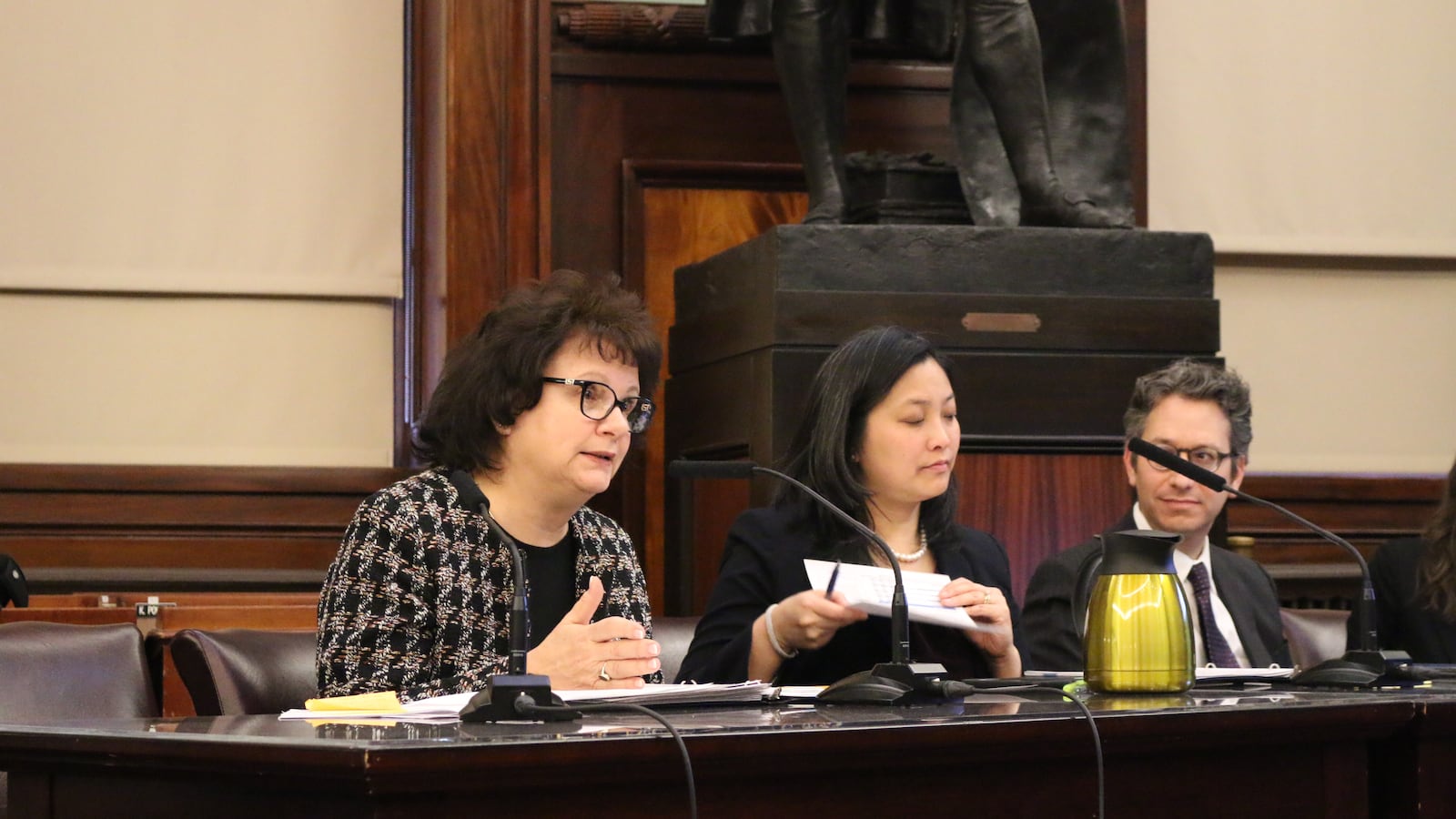 Corinne Rello-Anselmi (left) testifies among senior education department officials at a City Council hearing on special education.