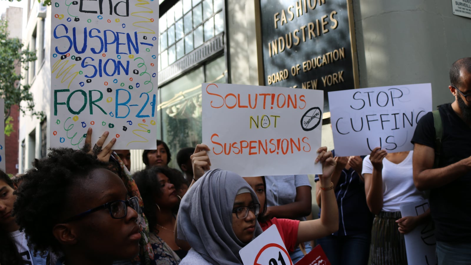 Advocates protested the city's suspension policy.