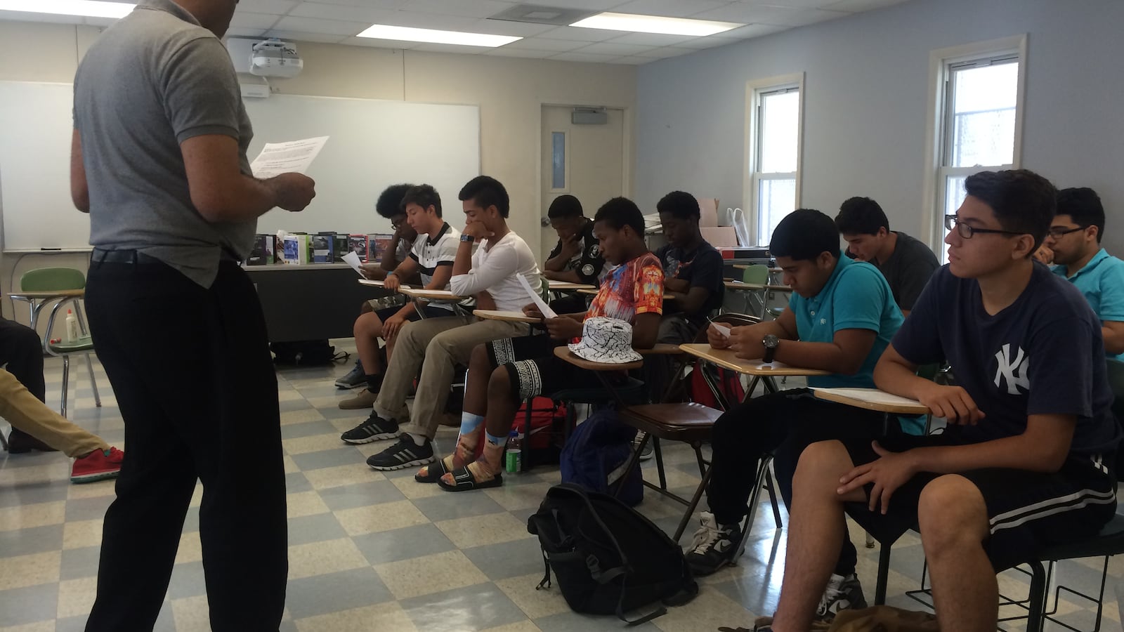 Students in Urban Ambassadors work together to prepare for a class debate on Common Core.