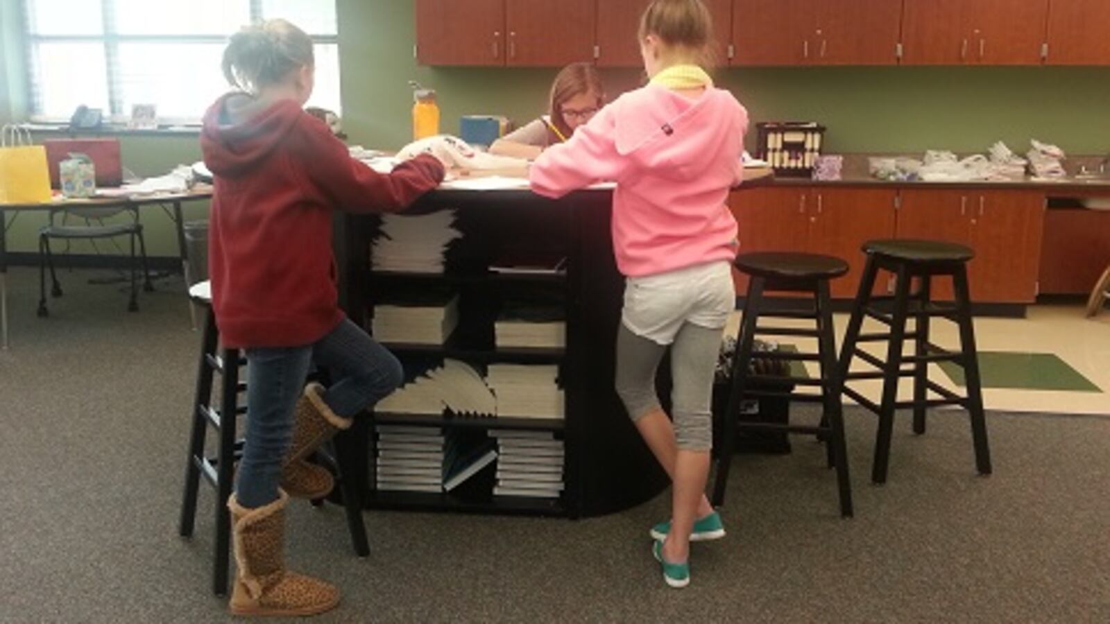 Girls standing in Lisa Puckett's classroom in the Cherry Creek school district.